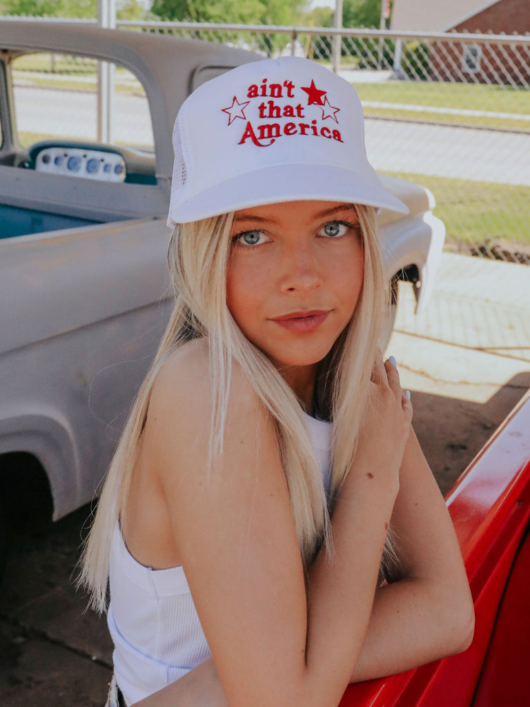 AIN'T THAT AMERICA TRUCKER HAT
